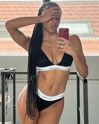 Photo by Megan Ria on May 14, 2024. May be an image of 1 person, braids and bra..jpg