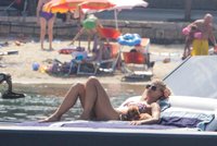 66219_Michelle_Hunziker_Bikini_Candids_on_Vacation_on_the_Island_of_Elba_August_16_2012_27_122_1.jpg