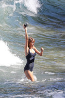 taylor-swift-in-a-blue-swimsuit-on-a-beach-in-hawaii-012115-3.jpg