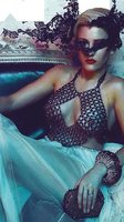 ellie-goulding-shows-boobs-and-nipples-in-see-through-chain-mail-style-top.jpg