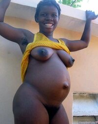 Pregnant-Black-African-Woman-Undressing.jpg